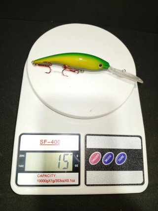 Señuelo de pesca verde y amarillo