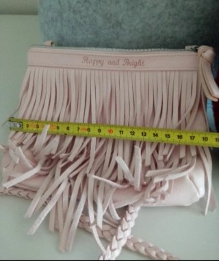 Lote 2 bolsos: rosa flecos y mochila borreguito