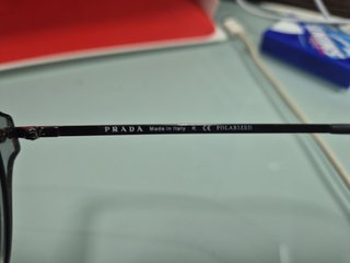 Gafas de sol Prada grises y negras