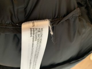 Chaleco largo pluma (Zara)