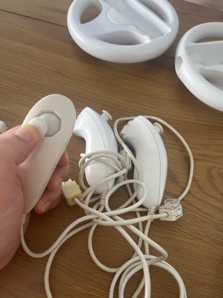 Nintendo Wii con 2 volantes y 3 joysticks