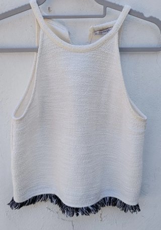 Conjunto top y falda blanco con flecos