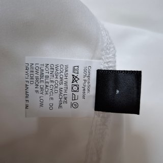 Top plumeti Shein blanco