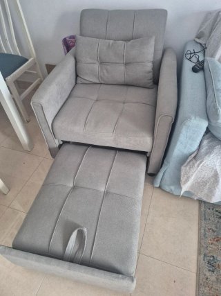 Sillón reclinable gris de tela