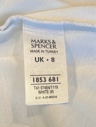 Camiseta M&S blanca con volantes