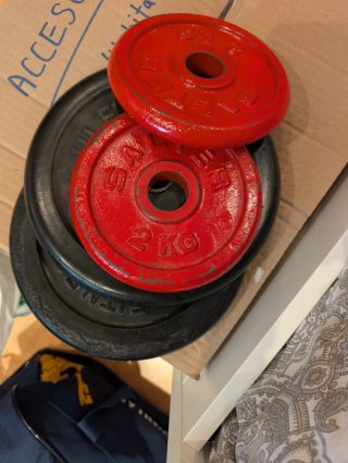 Pack 14 kg discos pesas (2x5kg + 2x2kg)