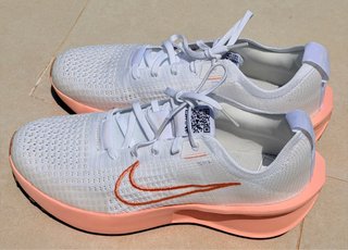 Zapatillas Nike Running Blancas y Naranja