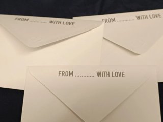 Tre buste da lettera con fiori