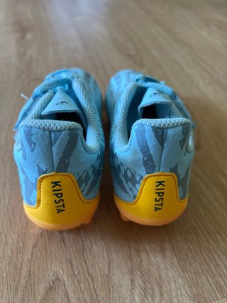 Botas de fútbol niño azul