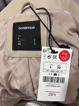 Chubasquero engomado beige