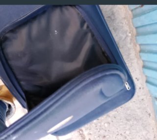 Maleta pequeña con ruedas azul
