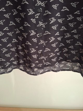 Camisa sin mangas con estampado de pájaros