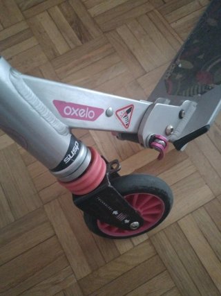 Patinete infantil rosa y plateado