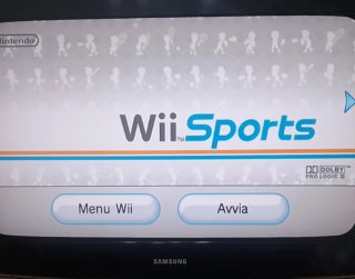 Nintendo Wii con giochi e telecomandi