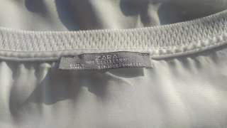 Blusa vaporosa blanca con transparencias
