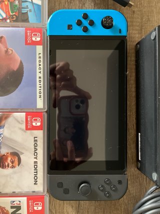 Nintendo Switch + 4 Juegos y Accesorios