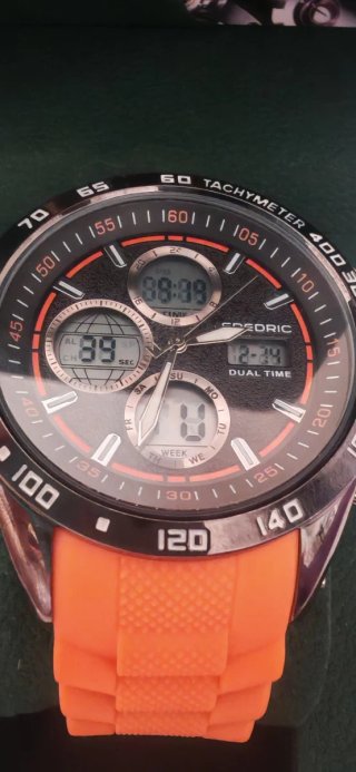Reloj Frederic Negro y Plateado Con correa naranja
