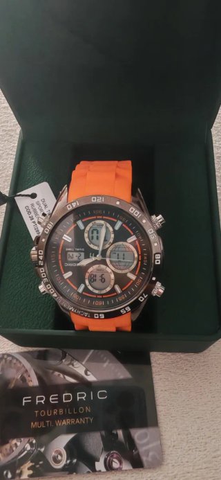 Reloj Frederic Negro y Plateado Con correa naranja