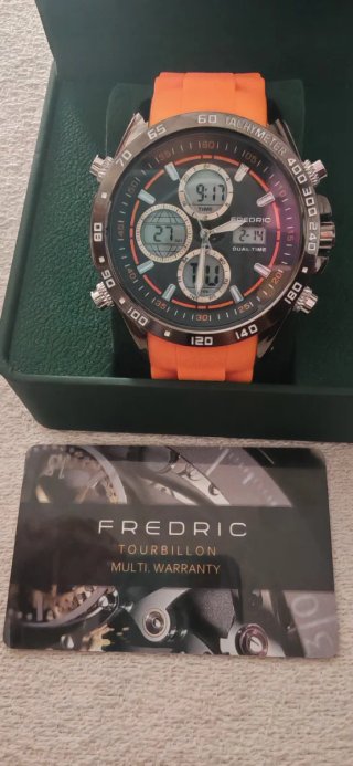 Reloj Frederic Negro y Plateado Con correa naranja
