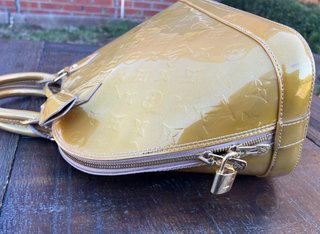 Bolso Louis Vuitton Alma PM Dorado Golden