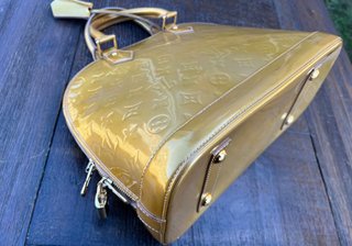 Bolso Louis Vuitton Alma PM Dorado Golden