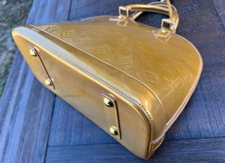 Bolso Louis Vuitton Alma PM Dorado Golden