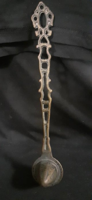 Apagavelas inglés victoriano antiguo de bronce.