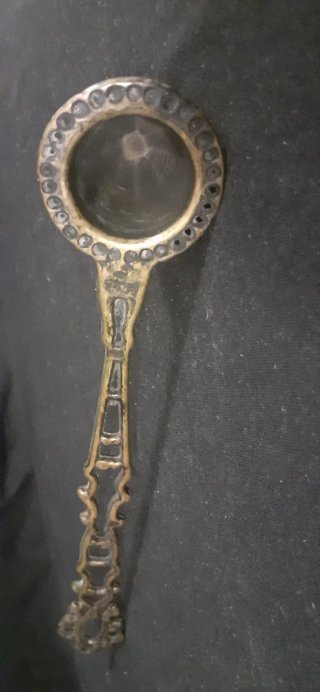 Apagavelas inglés victoriano antiguo de bronce.