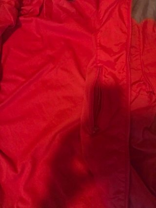 Chaqueta cortavientos Nike roja y gris