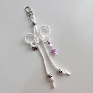 Colgante charm mariposa blanco y morado BTS