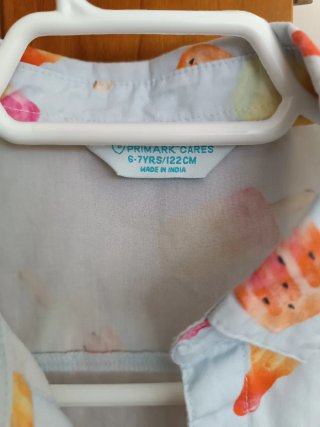 Camisa infantil con estampado de polos