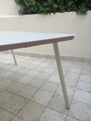 Conjunto de mesa y sillas de jardín.
