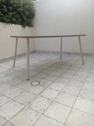 Conjunto de mesa y sillas de jardín.