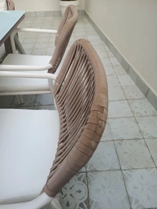 Conjunto de mesa y sillas de jardín.
