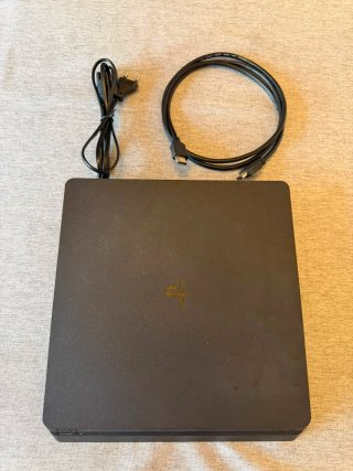 PS4 Slim 500 GB Negra + mando y 6 juegos