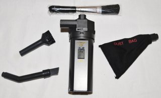 Mini aspiradora de mano con accesorios