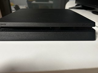 PS4 Slim 1TB + 2 Mandos + Cables