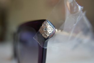Occhiali da sole Chopard viola e oro
