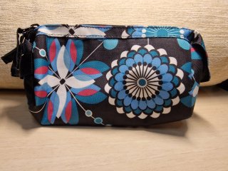 Estuche Rip Curl Negro Flores Azules