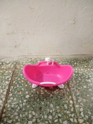 Bañera rosa de juguete