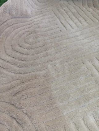 Alfombra redonda beige diseño geométrico
