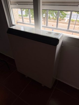 Acumulador de calor beige y negro