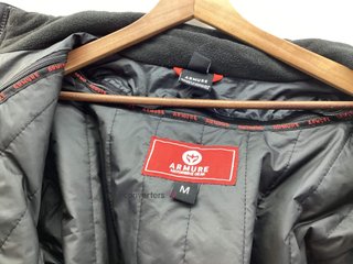 chaqueta joma