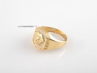 sello oro 18k con piedra con circonita