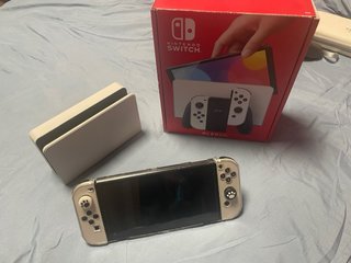 Nintendo Switch OLED + Accesorios