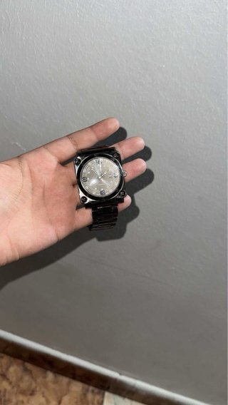 Reloj cuadrado plateado de  hombre
