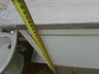 Mueble de baño blanco y madera