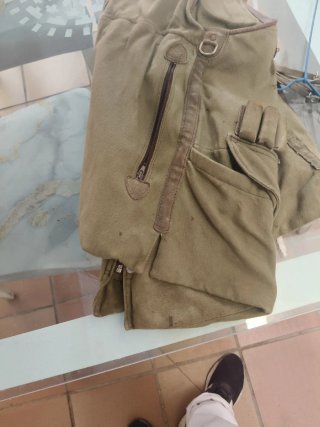 Chaleco de caza y canana