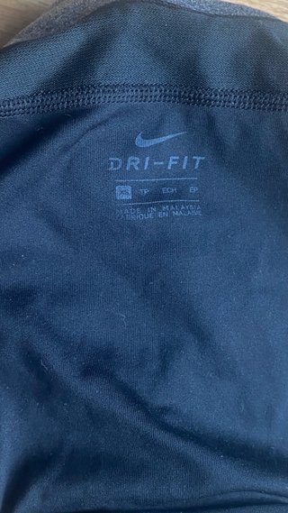 Pantalón corto running Nike negro y gris