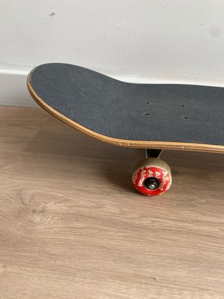 Skate Almost con diseño Smiley